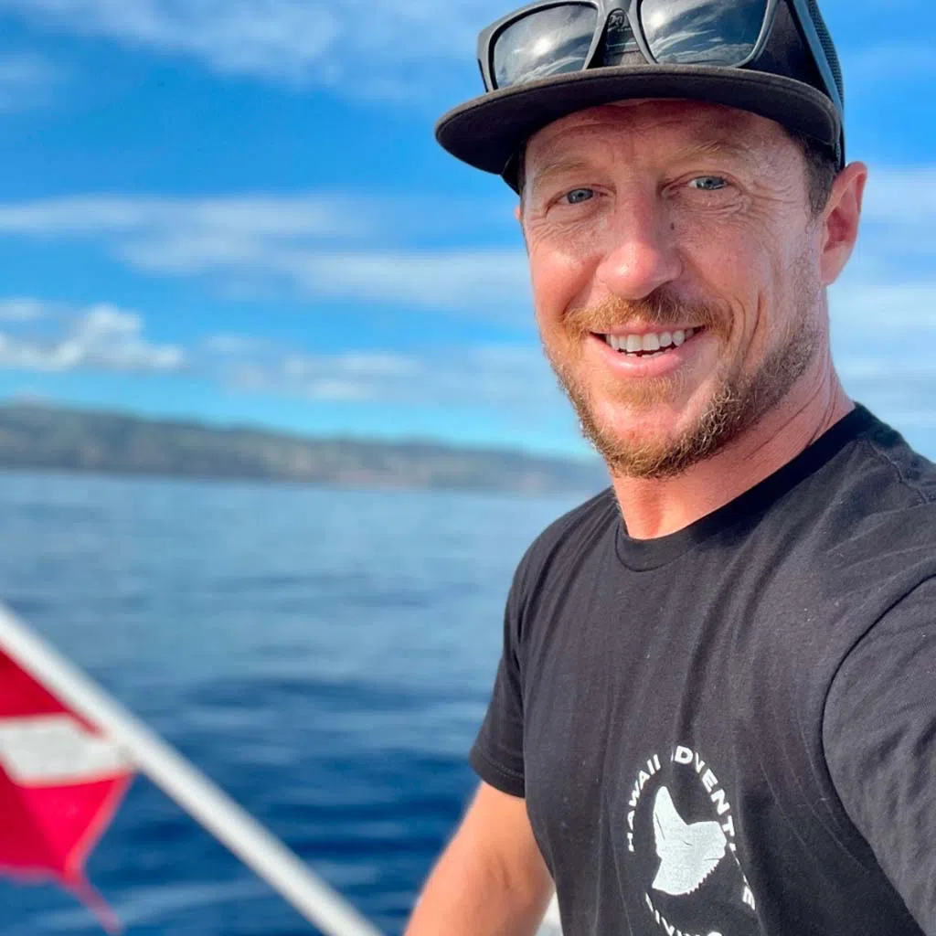 Headshot of Hawaii Adventure Diving captain Ro O\'Rourke looking toward the camera on the Hawaii Adventure Diving Boat getting ready for a tour.